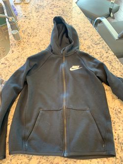 Black Nike zip up hoodie. Size: youth large