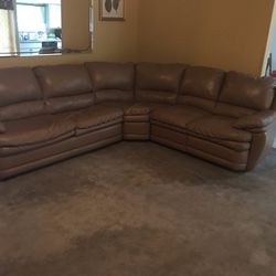 Lightly Used Pull Out Sofa bed With Built In Recliener , Light Brown, Longer Side 8ft, Shorter Side 7ft. 