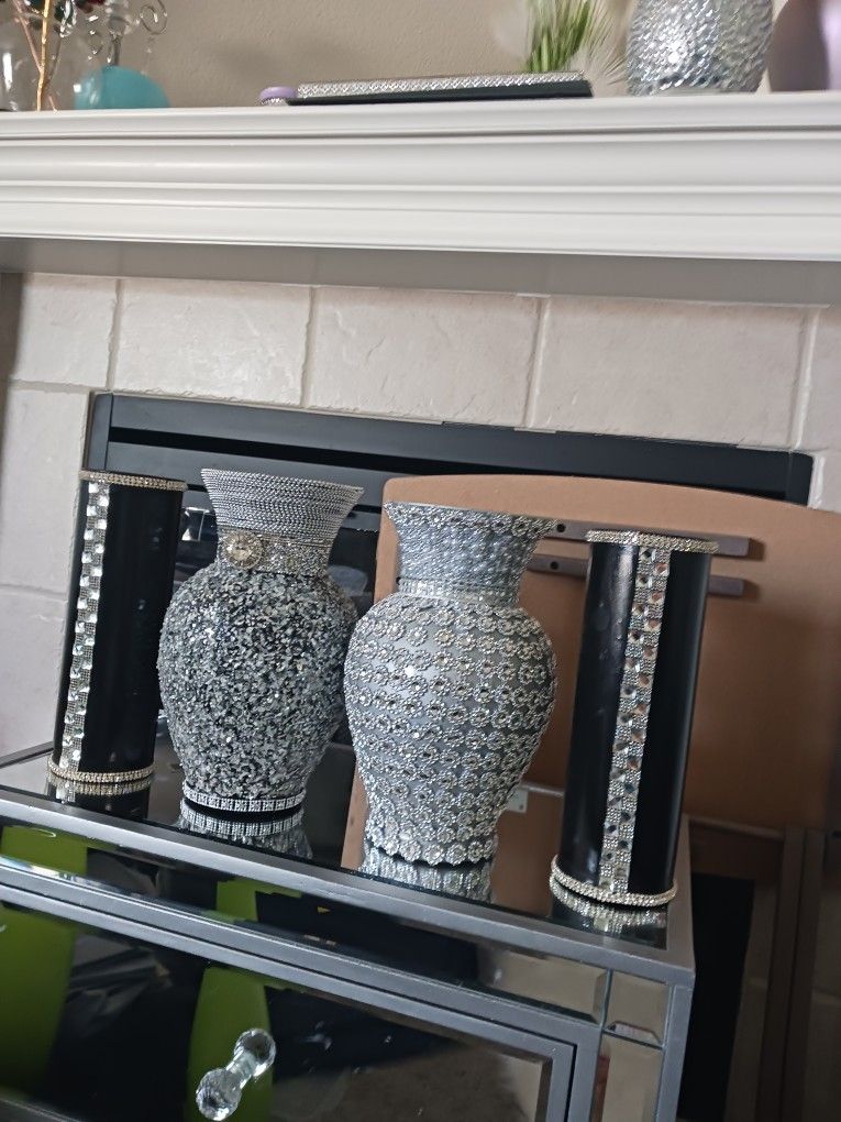 4 VASES..BLACK IS 10 FOR SET..OTHER VASES ARE 25 EACH.