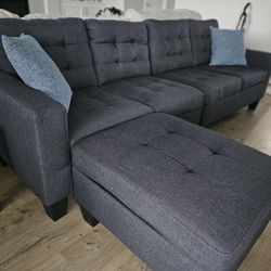 beautiful sofa with pouf