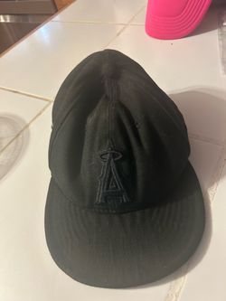 black New Era Los Angeles Angels fitted cap featuring a tonal embroidered "A" logo on the front crown