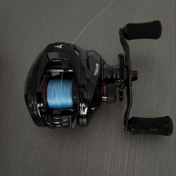 baitcaster fishing reel spooled w/ 20lb braided line 