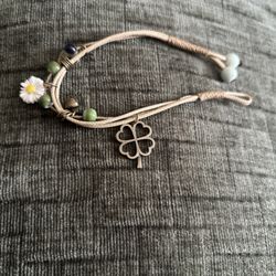 Handmade Charm Bracelet with Four-Leaf Clover, Daisy Bead, and “Made With Love” Heart Tag