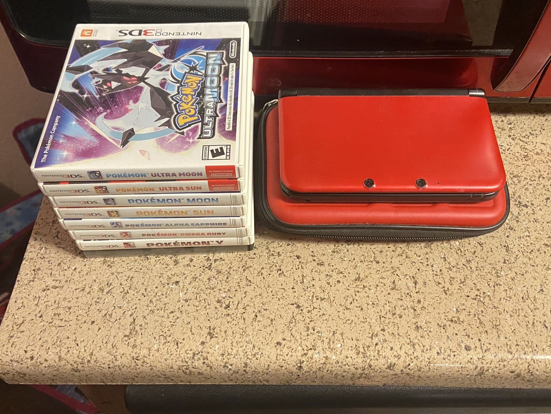 Nintendo 3DS XL System Red and Black Bundle + 8 Games And Case