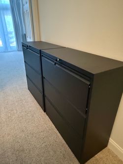 Metal file cabinets like brand new.