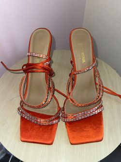 Orange strappy heels