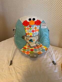 Baby bouncy chair and play mat