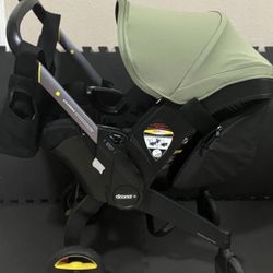 Doona Infant Stroller (Green And Black) 