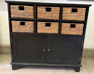 Dark wood storage with baskets