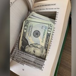 This stash box comes in a green hardcover. It is hollowed out 3/4th of the way through to create a perfect spot to hide or secure your valuables. Grea