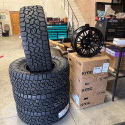 17x8.5 KMC KM555 Matte Black Wheels + 35x12.50R17 Toyo A/T3 – 6x5.5 – Brand New – Package Deal