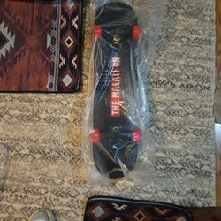 The Marathon Continues Skateboard