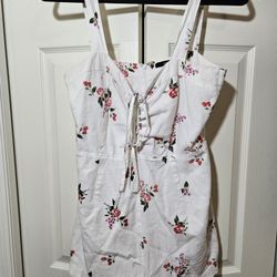 Forever twenty one size large, white romper, with flowers