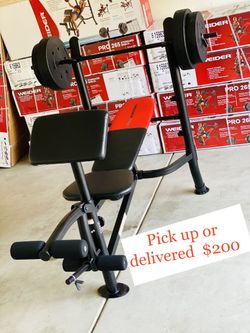 BENCH PRESS W WIEGHTS (FULL SET) $200 