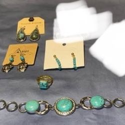 Brand new Collection of fashion jewelry featuring turquoise-colored stones set in silver-tone metal earrings,ring,earrings bracelets. $5 Each 