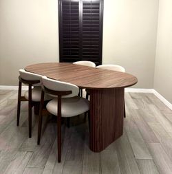 Brown Oval Dining Table