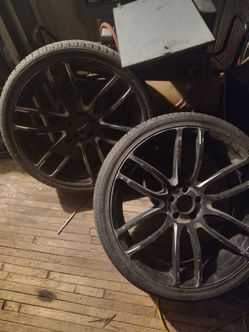 Four 22 inch rims 3 have tires