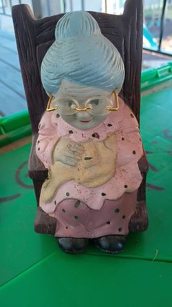 Grandma piggy bank in Rocking Chair