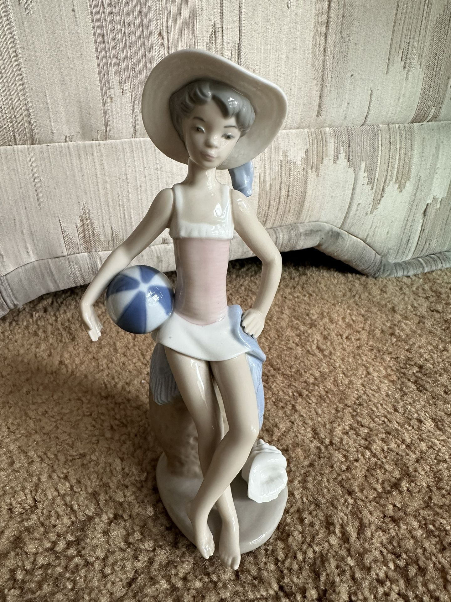 Lladro Figurine- Girl in swimsuit, with Beach ball & seashell 
