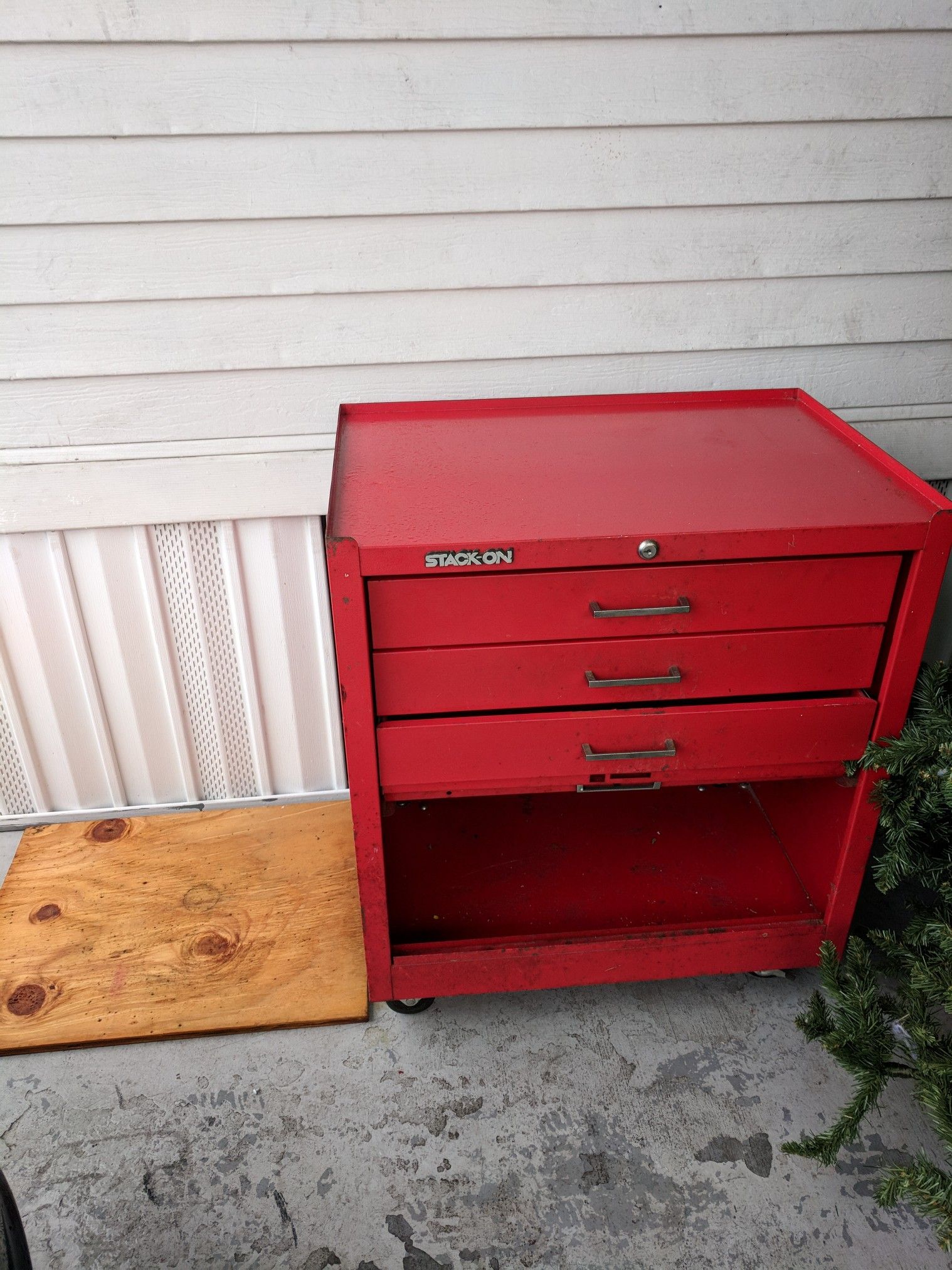 Stack on red tool box