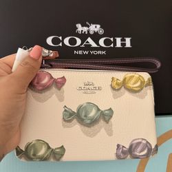 Coach Corner Zip Wristlet With Candy Print And Charm