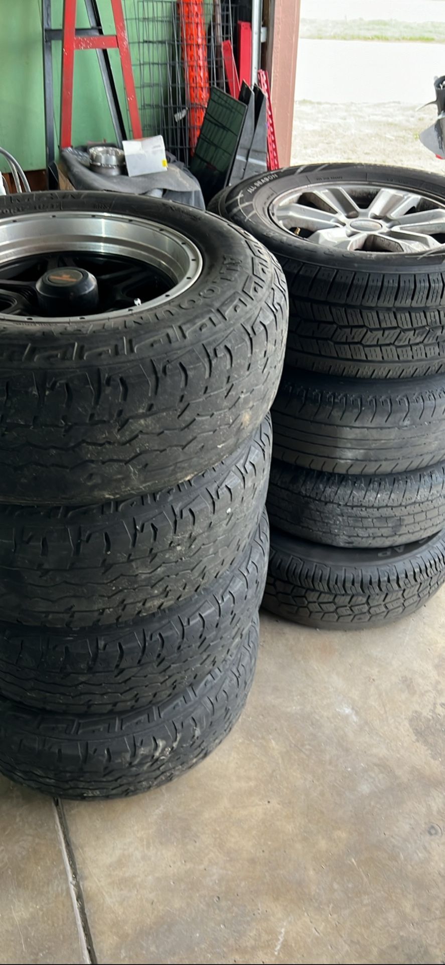 Ford F150 Stocks And Black Rims Of A 2005 Nissan Titan