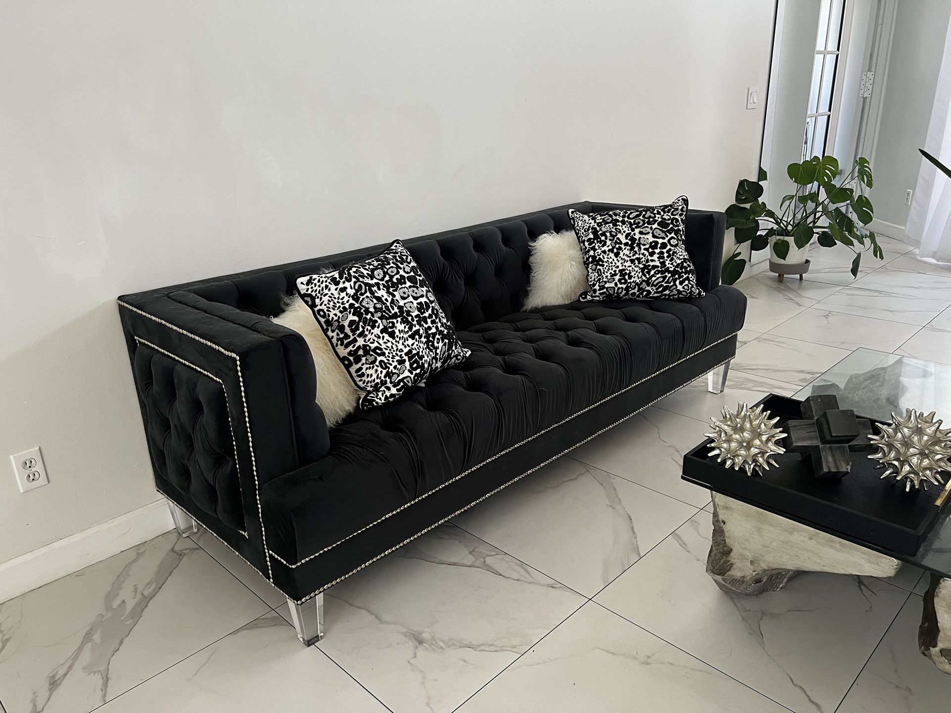 Black Tufted Stud Couch With Clear Legs