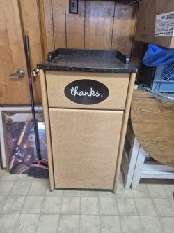 Garbage Bin With Swinging Lid