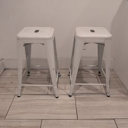 Two white steel stools
