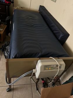 Adjustable medical hospital bed equipped