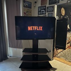 Emerson 55in TV With Shelved Tv Stand 