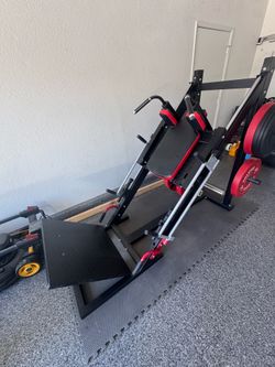 Leg press hack squat combo with weights