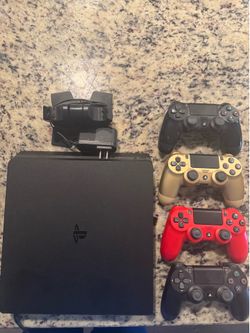 PlayStation 4 with 4 controllers