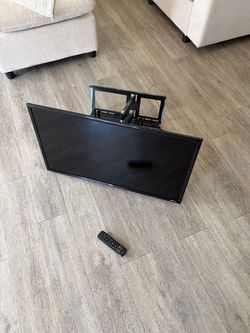 31 inch TV with a remote control perfect working condition. Wall mount included