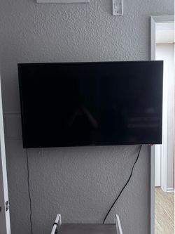 45 inch tv (not smart tv) comes with remote not with tv stand.