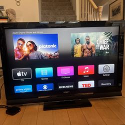 Sony Bravia 46”  TV w/Apple TV And Remotes 
