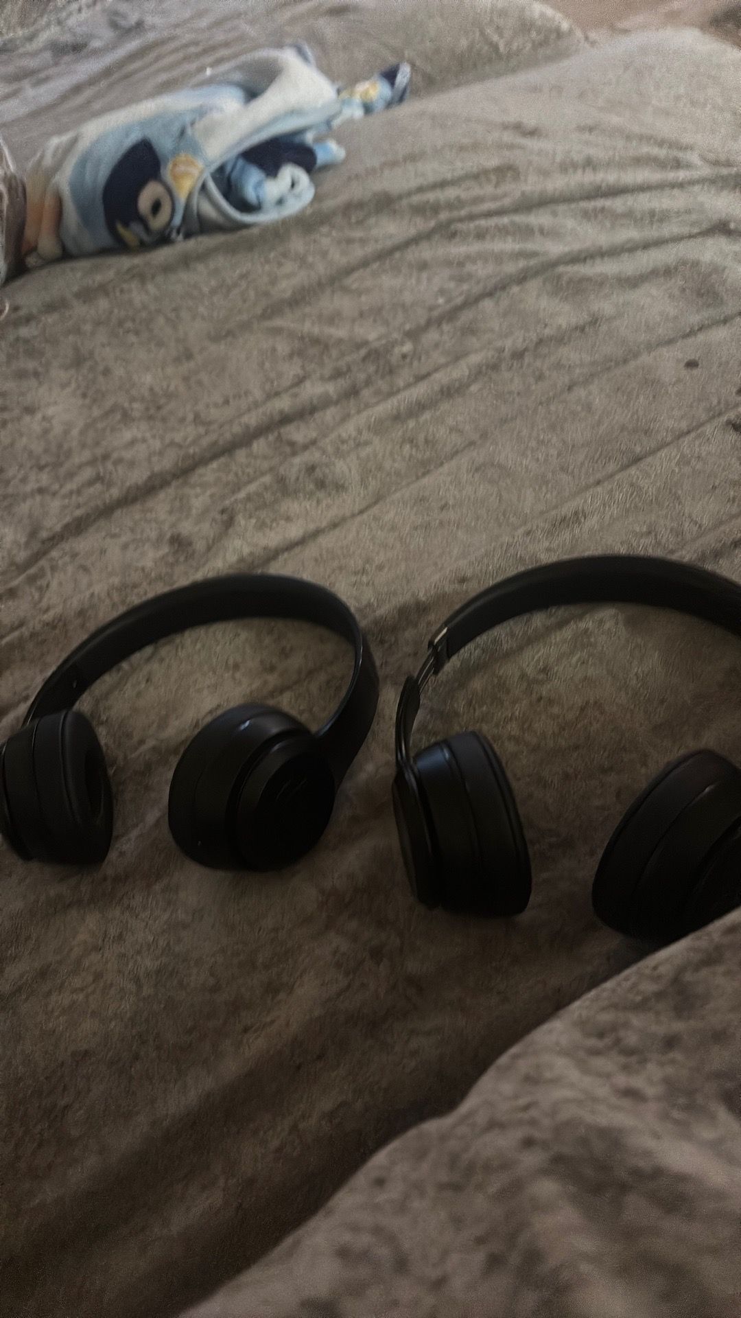 Two pairs of beats headphones