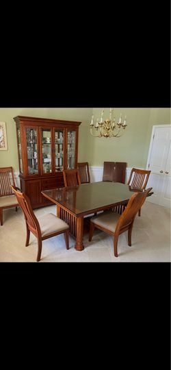 Table set and china cabinet .