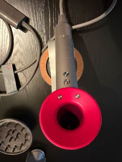 Dyson blow dryer with stand