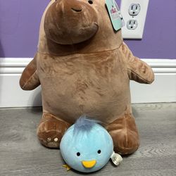 Two Stuffed Animals, Brown Bear And Blue Bird
