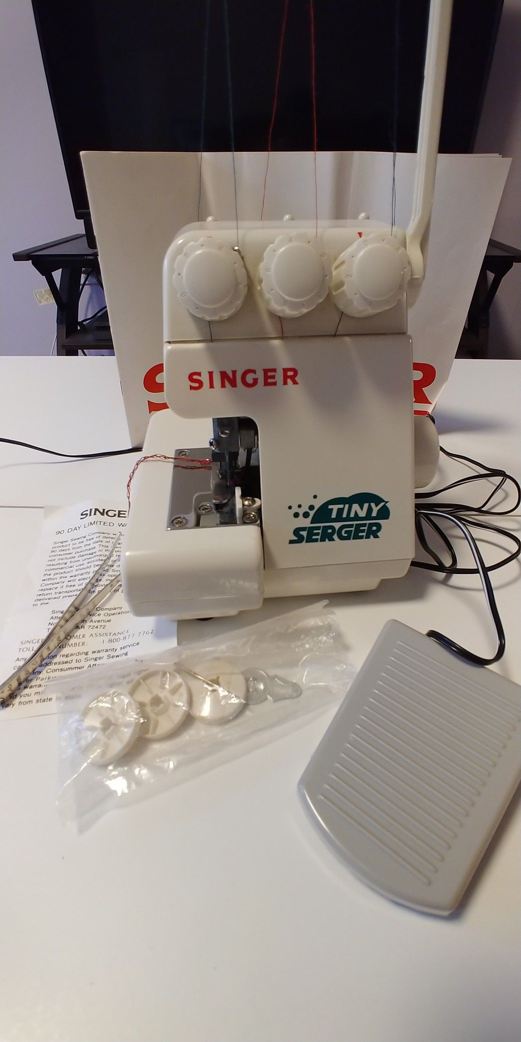 Singer Tiny Serger TS380A Comes W/AC Adaptor,Manual,Foot Pedal,Thread