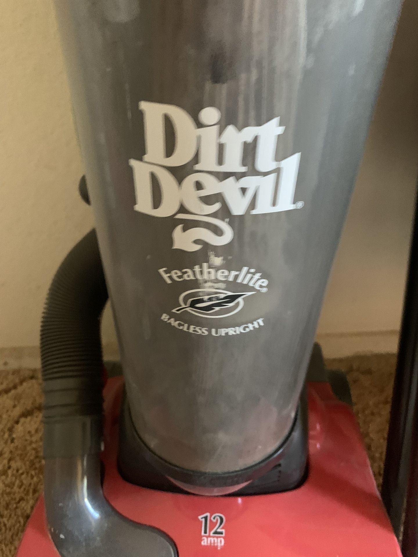 Dirt Devil bagless upright vacuum, red