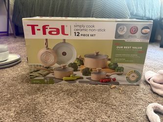 Brand new set of pots and pans and plates