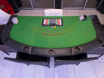 Black Jack table with poker chips, shoe and cards