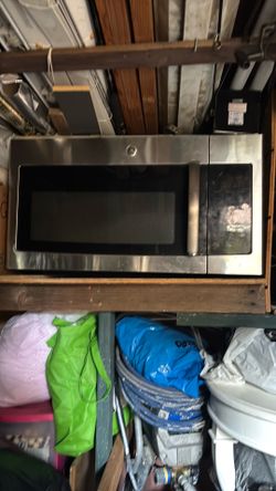 GE Microwave 16 inch high 30 inch wide 21 inch deep