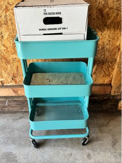 Teal rolling cart