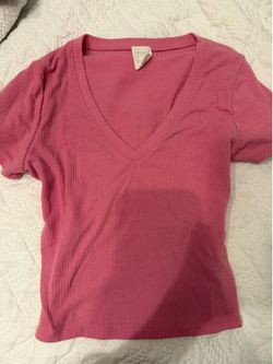 Simple pink V-neck women’s shirt