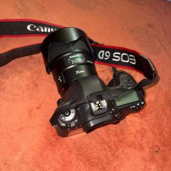 The Canon EOS 6D works 100% is a compact full-frame DSLR designed as an entry point for photographers moving from crop-sensor cameras to full-frame. I