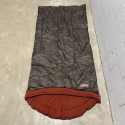 COLEMAN SLEEPING BAG CAMPING GEAR 6’x32" Brown with Red Orange Lining  Great pre-owned condition.   Pick up available in Arlington VA by the Sheraton 