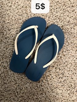 Blue Flip Flops with White Straps